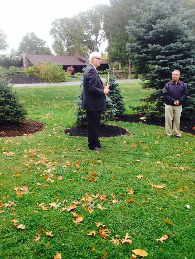 Man speaking at park for Peg Castina dedication